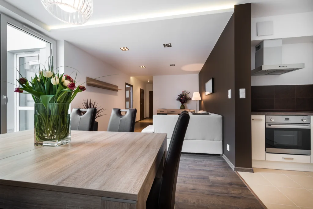 image of open plan kitchen, dining and lounge room